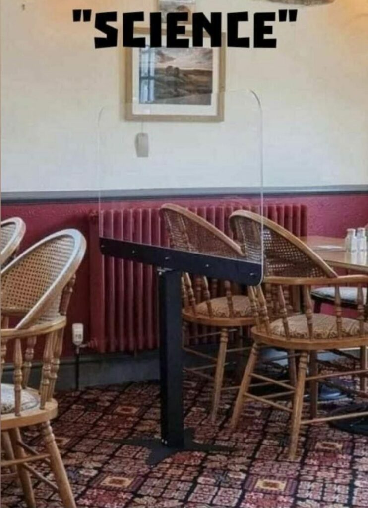 Tables separated by a plastic. Science.