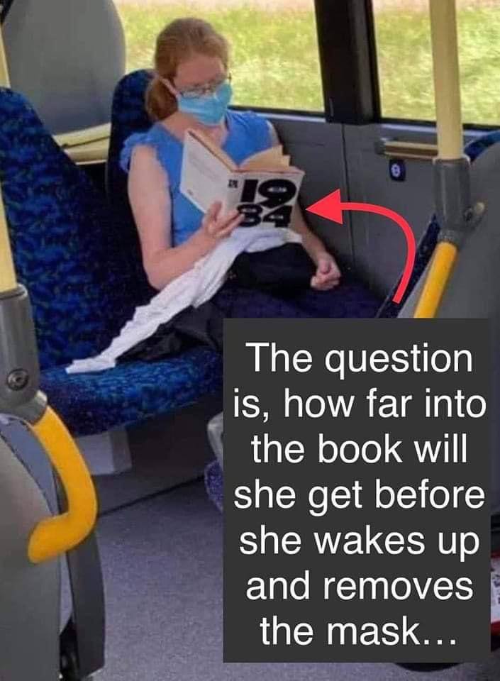 Masked woman reading from 1984